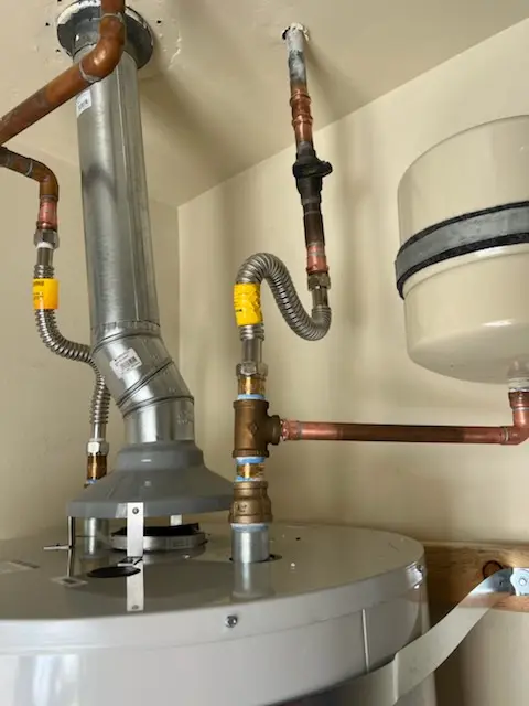 Water heater installation and plumbing repair in Mimosa Cove